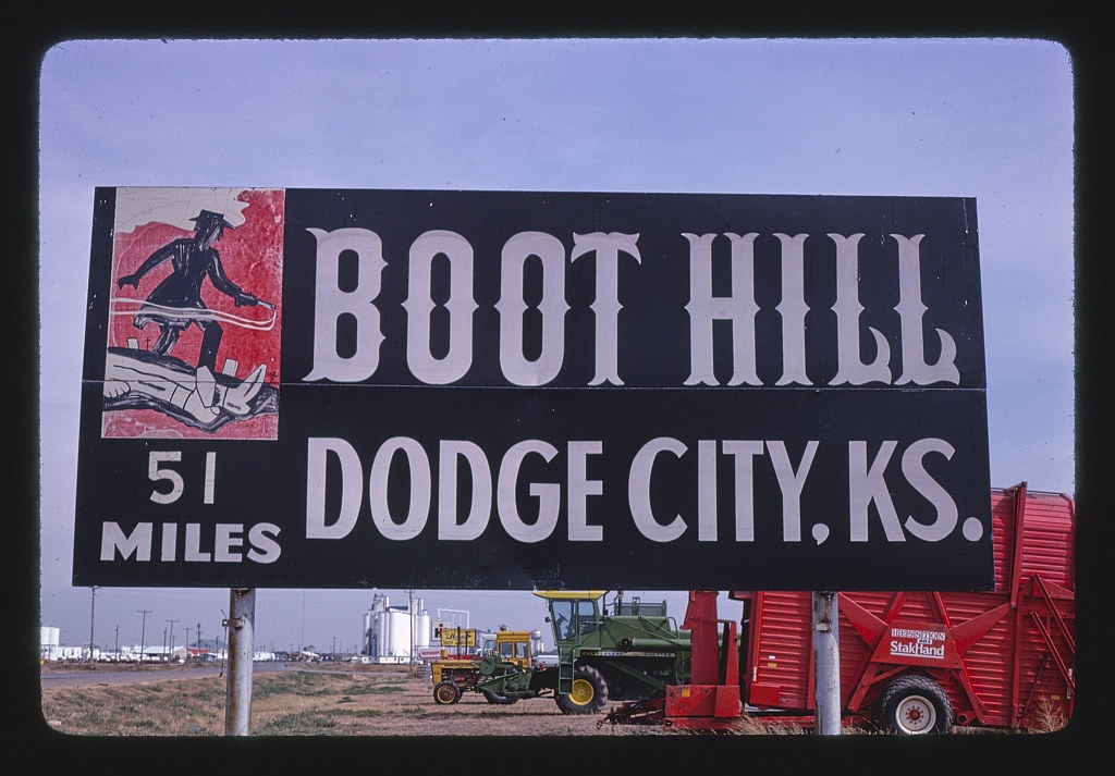 Billboard: "Boot Hill, 51 miles, Dodge City, KS," near Goddard, Sublette, Kansas (LOC)