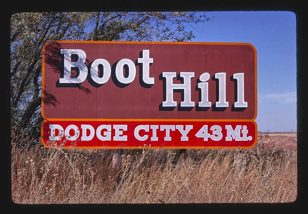 Billboard: "Boot Hill, Dodge City, 43 miles." Greensburg, Kansas (LOC)