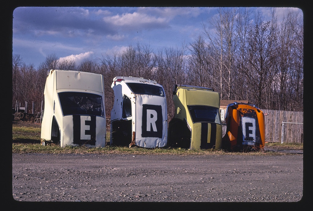 Erie Foreign Car Parts multi-statue sign, angle 1, Mohawk Street, Whitesboro, New York (LOC)