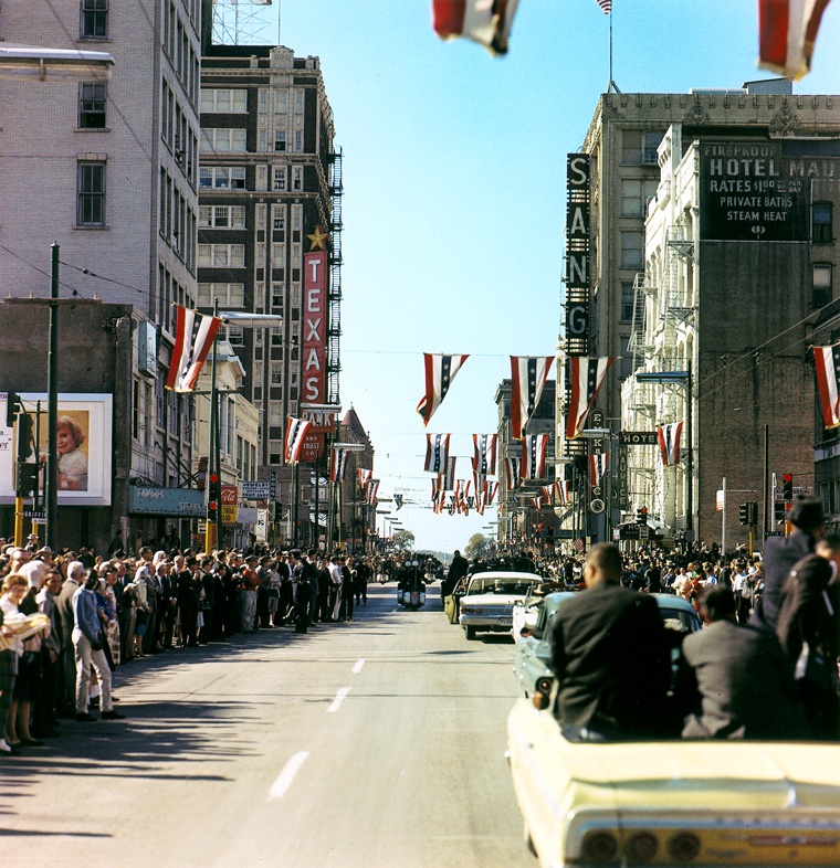 Motorcade on Main - President John F. Kennedy's motorcade on Main Street, approching Dealey Plaza in Dallas, Texas. Seen seen from the second photographers' car. (Accession Number: ST-C420-21-63)