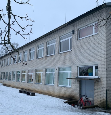 View of the school building in Kodila sovhoos in Rapla district. rephoto