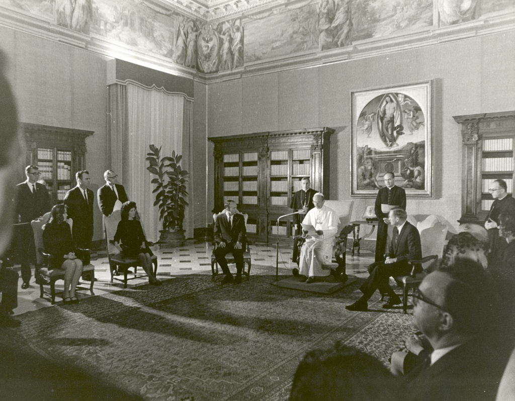 Apollo 11 Astronauts Receive a Papal Audience by Pope Paul VI - GPN-2002-000018 - The Apollo 11 astronauts, Neil A. Armstrong, Edwin E. Aldrin, Jr., Michael Collins, and their wives receive a papal audience by Pope Paul VI in the Papal Library, St. Peters Cathedral at the Vatican. The GIANTSTEP-APOLLO 11 Presidential Goodwill Tour emphasized the willingness of the United States to share its space knowledge, and carried the Apollo 11 astronauts and their wives to 24 countries and 27 cities in 45 days.