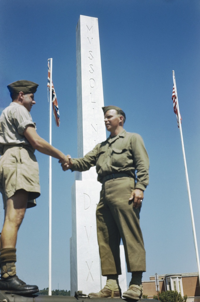 Allied Forces Sports Meeting at the Foro Italico, Formerly the Mussolini Forum, Rome, July 1944 TR2104 - Allied Forces Sports Meeting at the Foro Italico, Formerly the Mussolini Forum, Rome, July 1944
Driver Hoe of Mansfield, Nottinghamshire and Adolf Meisler from Rheinlander, Wisconsin, USA, shake hands in front of the entrance to the stadium and the Mussolini Monolith.