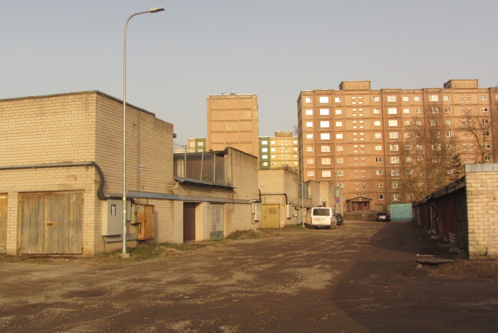 Cooperative magazines of Tartu, Kuuse Street. Construction of the foundation of the high building in the rear plan. Look out of town. rephoto