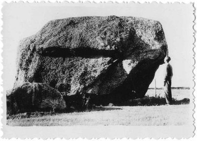 Weak stone Be on the beach of the village  duplicate photo