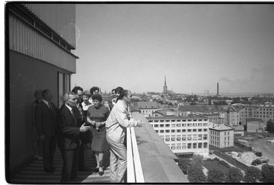 The main building of the ECB KK on the theatre square (Island square). Visitors to the building on the roof of the main building of the ECB KK. View from the roof to the Theatre Square.  similar photo