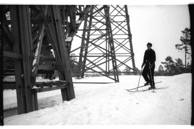 Mees suuskadel ja suusahüppemägi Nõmmel  similar photo