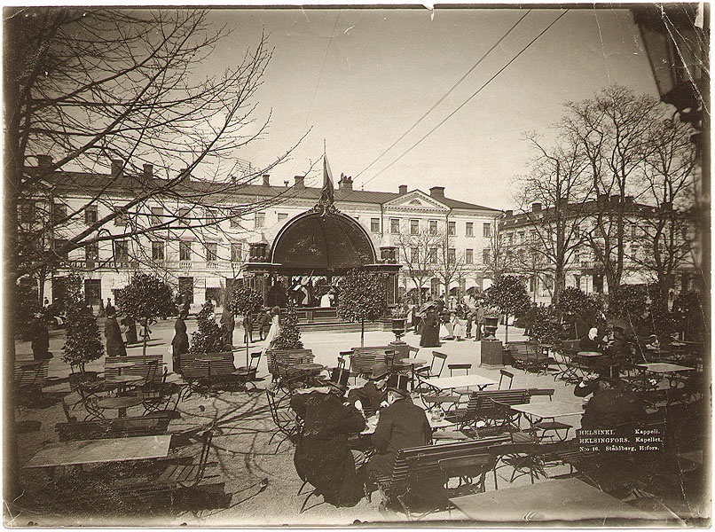 Helsingfors. Kapellet. Nr. 16. Några herrar sitter vid ett av borden, i bakgrunden en utescen. Kapellet. Nr. 16. Några herrar sitter vid ett av borden, i bakgrunden en utescen. Nr. 16. Några herrar sitter vid ett av borden, i bakgrunden en utescen. Några herrar sitter vid ett av borden, i bakgrunden en utescen.