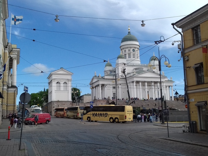 The Church of Helsinki Nikolai, the Bank of Finland and the building of the National Archive. rephoto