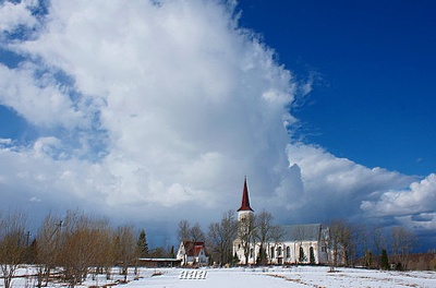 Harju-Jaani kirik, vaade edelast üle põllu. rephoto