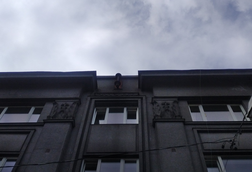 Apartment building with shops in Tallinn, Tatari 6, on the facade floor - the top side of the house with flag belts and captains; pictured from the lift. Architect Eugen Sacharias rephoto