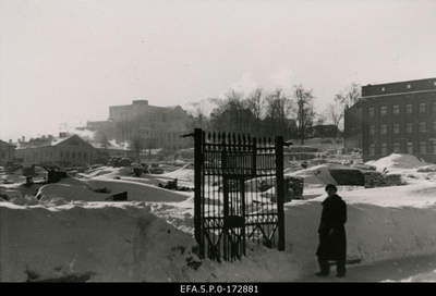 View from Aleksandri Street towards the Vanemuise Theatre, the ruins of the merchant court at the forefront.  duplicate photo