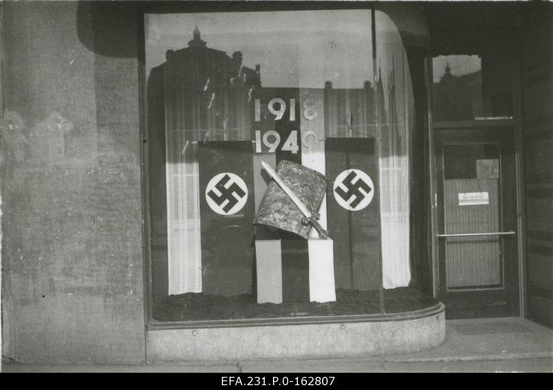 German occupation in Estonia. Adolf Hitler's birthday decorated textile store view Pärnu highway 6.