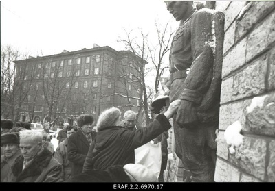 The 45th anniversary of the defeat of the German occupation of Tallinn is celebrated at Tõnismäel’s Tallinn Liberation Monument (Pronx Warrior). Flowers are placed on the monument  similar photo