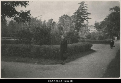 Natalie Valger Theatre "Vanemuise" in the park next to a small house  similar photo