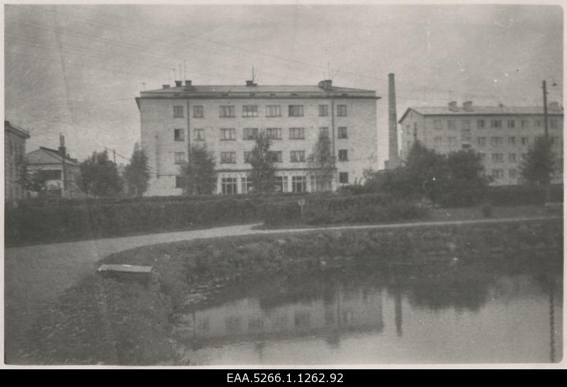 Tiiginurk Theatre "Vanemuise" in the park next to a small house, in the back of Tiigi Street new houses