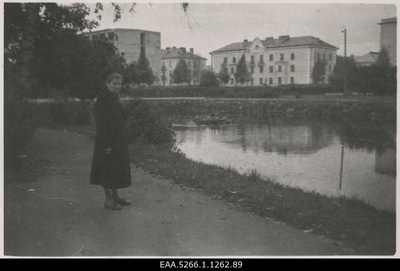 N. Valger Theatre "Vanemuise" in a park next to a small house next to a tigue, in the back of Tiigi Street, new houses  similar photo