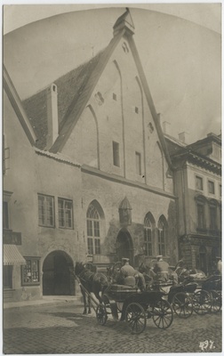 Suurgildi building on Pikal Street. In front of the square the knights with horse riders.  duplicate photo