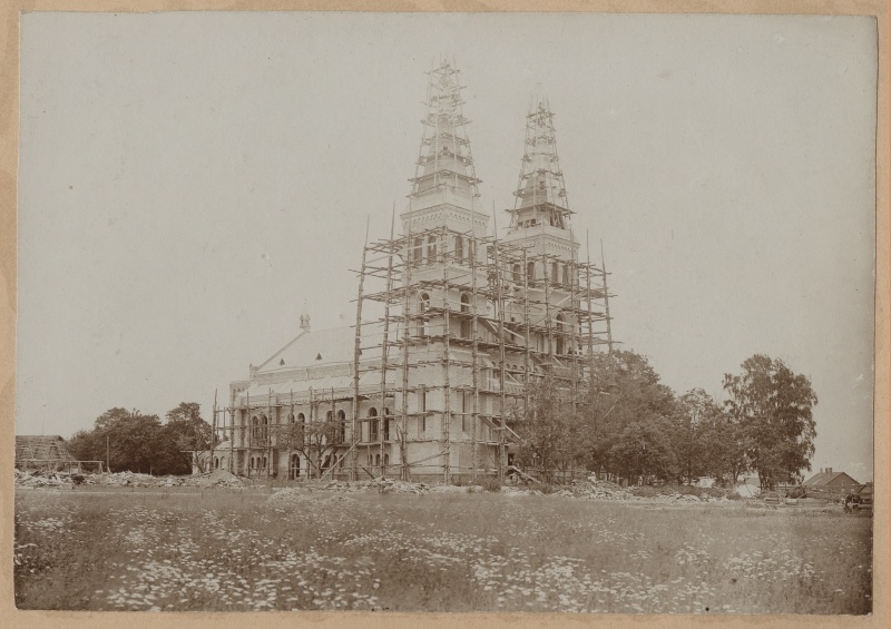 Rapla Church. View of the stories. In the middle of the order, church building with two towers.