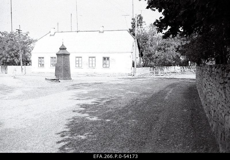 An old town yard with metal coating walls in Kingissepa.