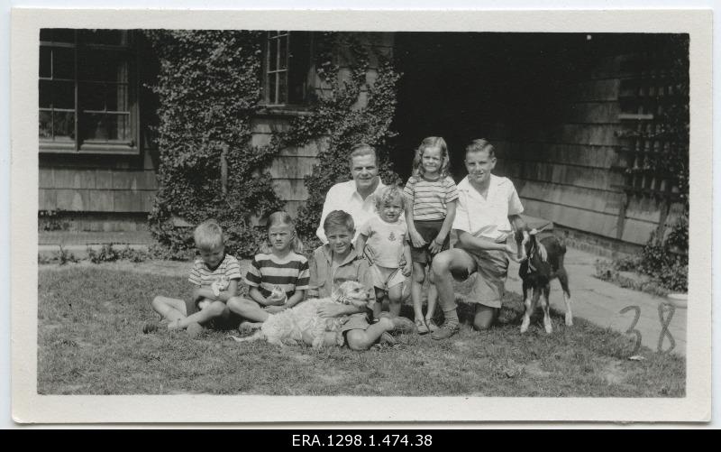 Robert Fleming Blair with children, dogs and goats