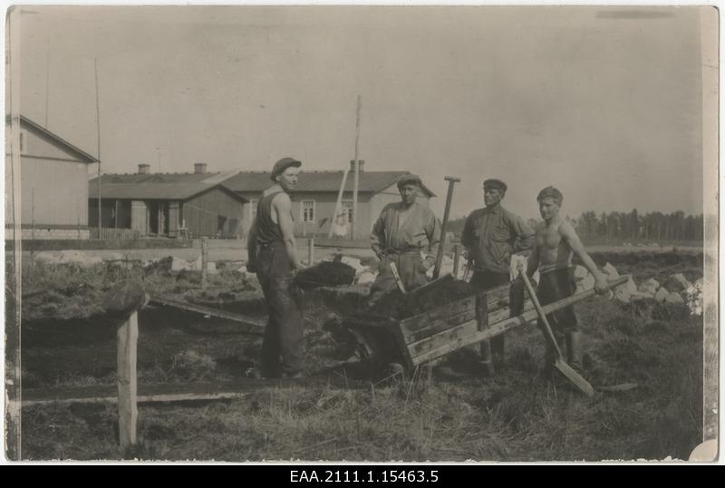 Workers build new barracks