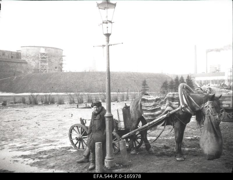 A man with horse at the Great Beach Gate.