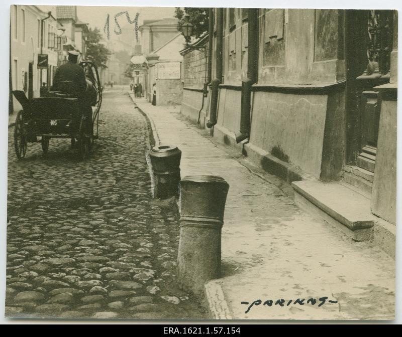 View New Street in Tallinn, old artillery cannons in front of the streets