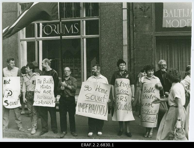 Baltic chain on the territory of Latvia. People hold English slogans: "The Baltic States are not Russian colonies!"