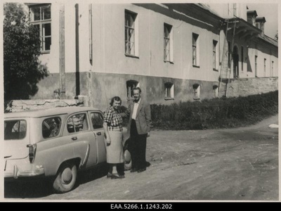 Benita Lab with an unidentified man in front of the Ingliste Manor  similar photo