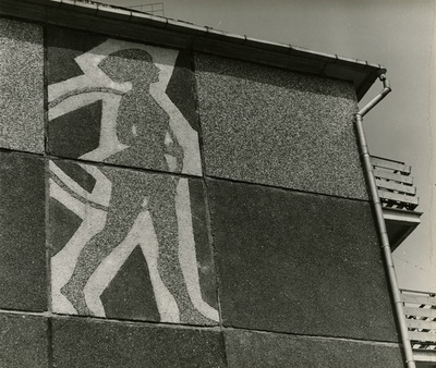 Mustamäe paneelelamu: Akadeemia tee 22 otsaseina sgrafiito võimlejannaga  similar photo