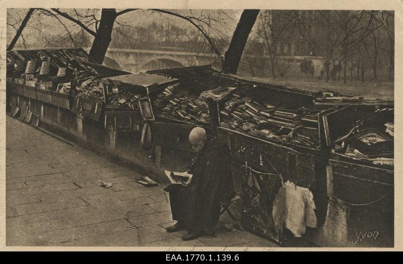 Street dealer of old books in Paris, postcard