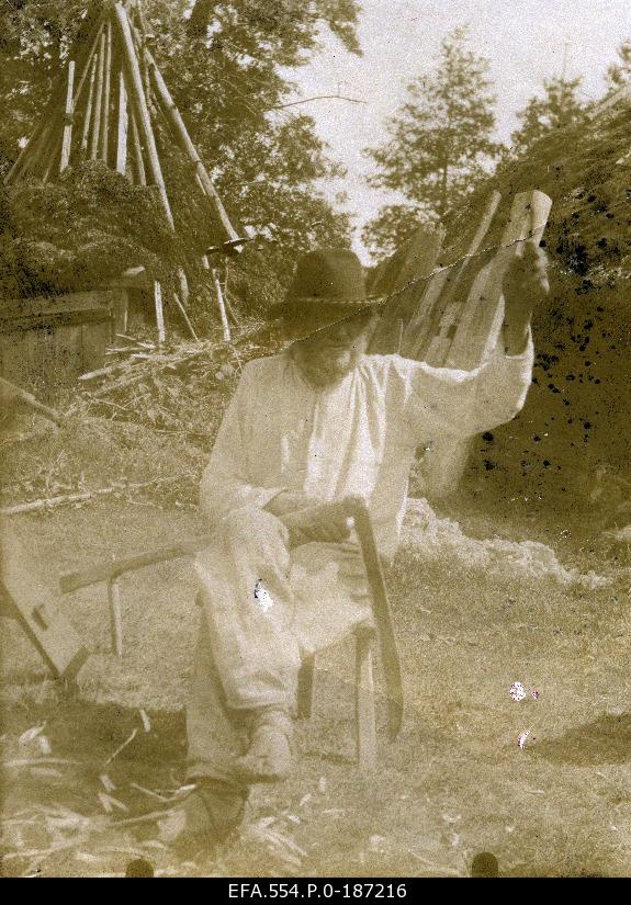 Kihnu tatta with a whistle, behind the summer cuisine.