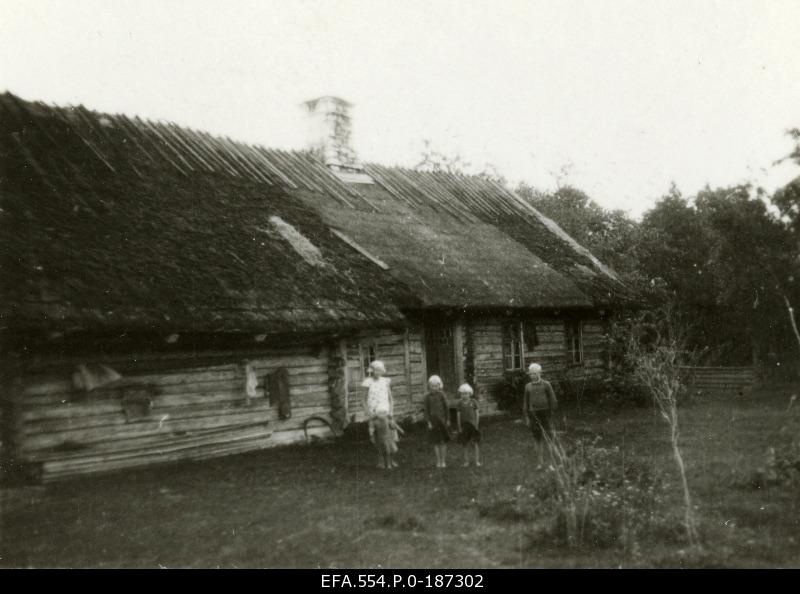 Children farm in the courtyard in front of the house.