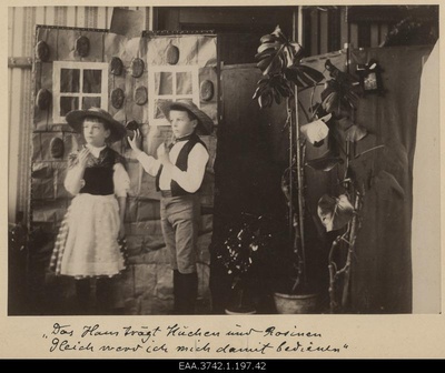 A scene from the "Hansuke and Greteke" family in the performance of Raehlmann's children  similar photo