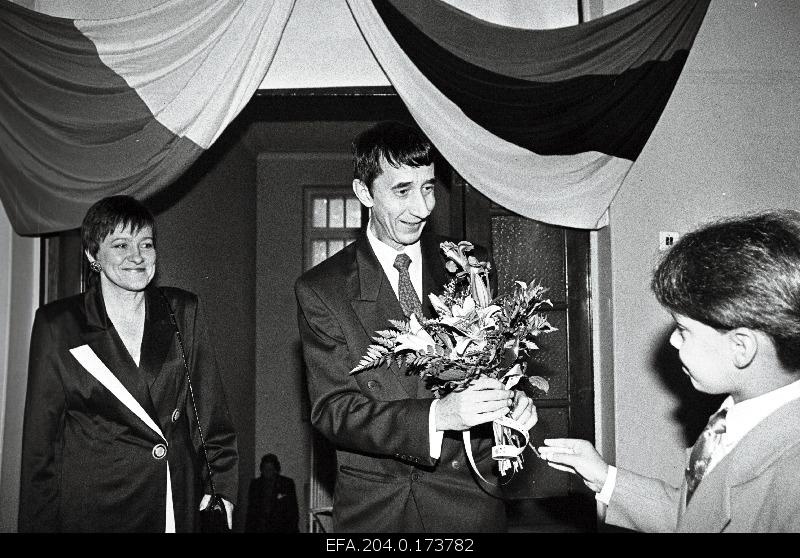 French Luceum teacher Silvi Vrait (left) and director Lauri Leesi welcome children on the first day of school.
