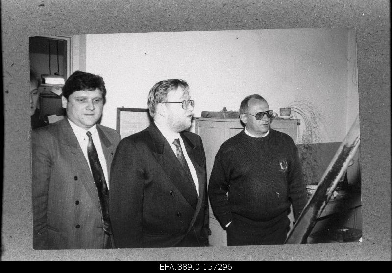 Prime Minister Mart Laar (in the middle), Hiiumaa County Senior Tiit Laja (in the left) and Director of the Literature Association Madis Salum are acquainted with the Museum Engineering of Kärdla Printhouse.