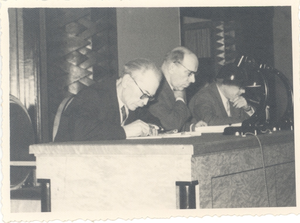 Friedebert in Tugla and Johannes Semper behind the presidium table