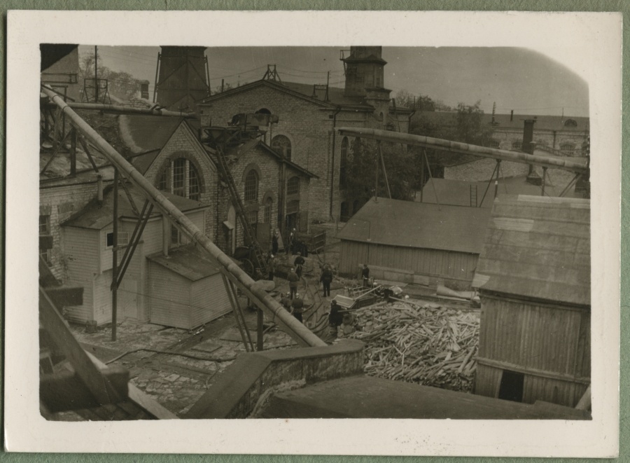 Firefighters at the yard of a. m. Luther factory