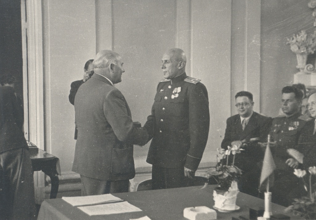 J. Vares-Barbarus (first left)