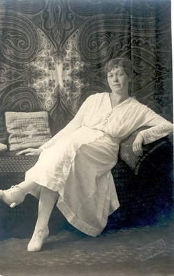 Under, m. sitting on the sofa in spring 1917 in Tallinn  similar photo