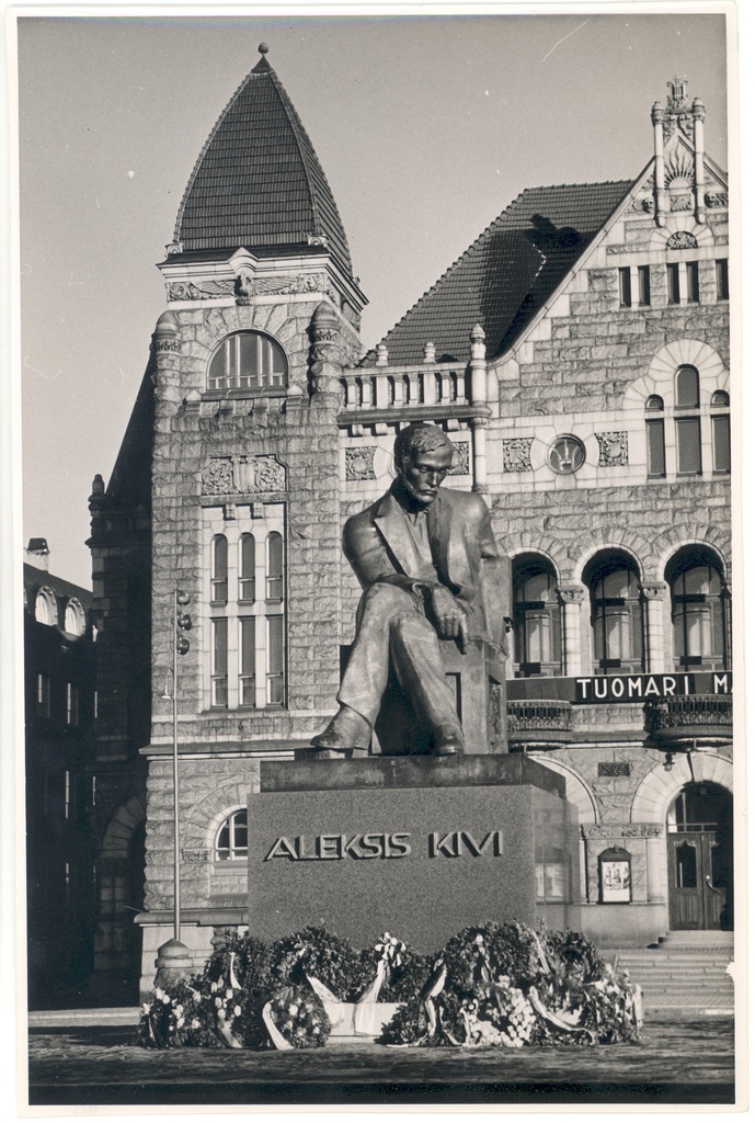 Aleksis Stone monument surrounded by pearga