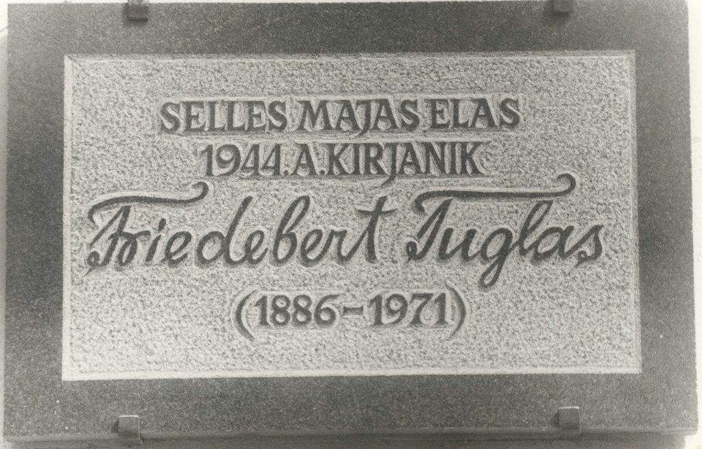 Monument tile Fr. On the wall of Tuglase house in Viljandi