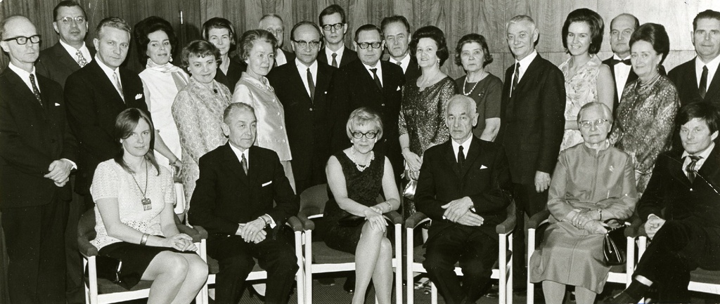 Celebration of the 25th anniversary of the Union of Writers in Stockhol in December 1970. VAS. (no) 1. Helga Nõu, 2. Bernard Kangro, 3. Ellen Kolk, 4. August Mälk, 5. Helmi Mäelo, 6. Ilmar Jaks; standing: 1. Arvo Mägi, 2. Harri Kiisk, 3. Juhan Kokla, 4. pr Kiisk, 5. Asta Lepik, 6. Model Uibopuu, 7. Lite Mountain, 8. Valev Uibopuu, 9. Ilmar Winter, 10. Enn Nõu, 11. Kalju Lepik, 12. Raimond Kolk, 13. Karin Saarin, 14. Fini Mälk, 15. Karl Ristikivi, 16. Eeva-Marie Kangro, 17. Meemo Mäelo, K 18. Kokla, 19. Herbert Salu