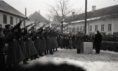 Placement of the cornerstone of the monument pillar dedicated to the rebellion of Saaremaa in the former pillar of the memorial pillar of the fallen in the War of Liberty: military personnel are saluteering  similar photo