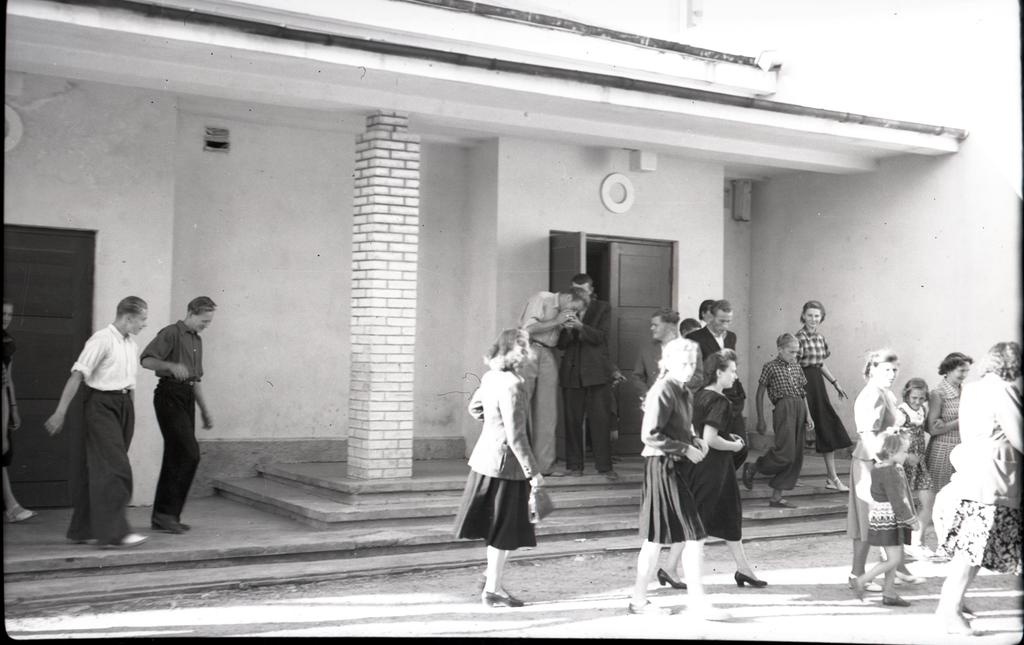 People exiting from the cinema in the Toll Street of October