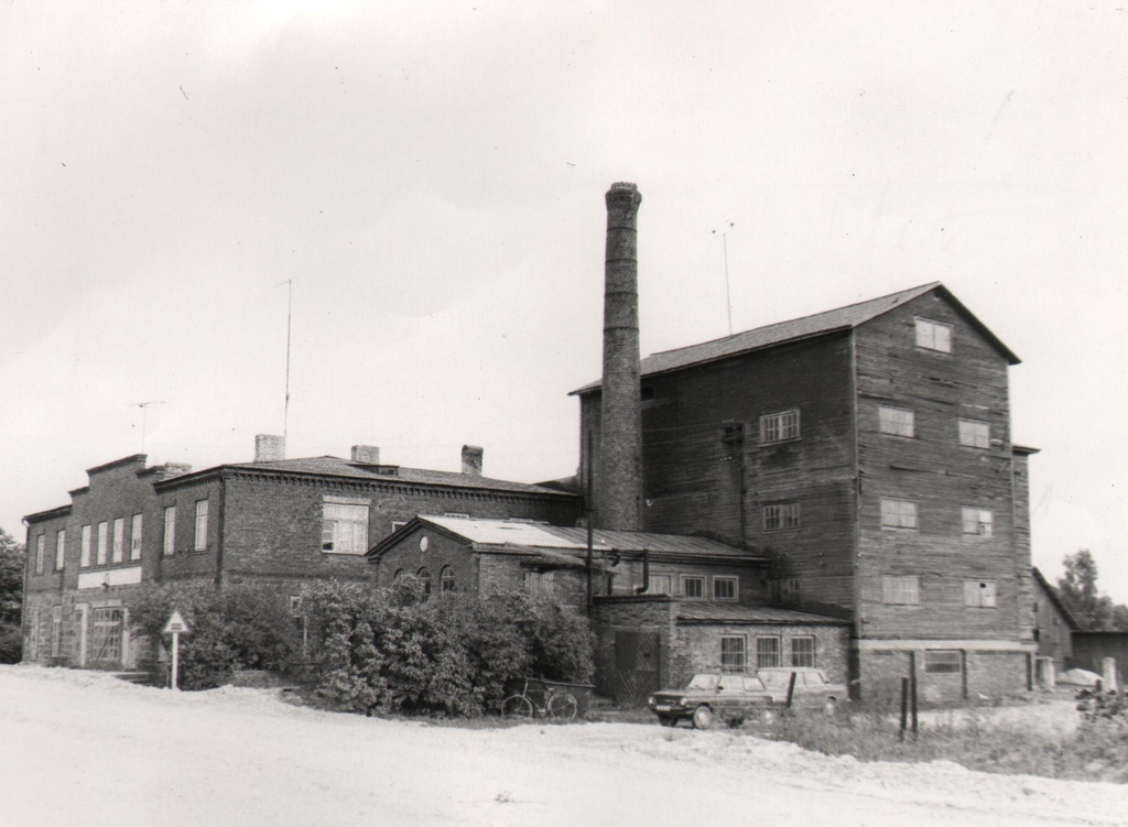 The former Võhma mill boiler with a millstone, a boiler and power plant in low part. 1984.