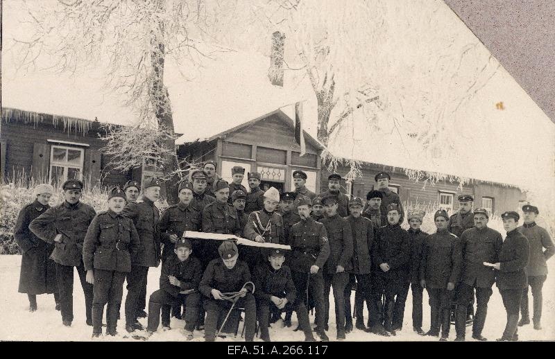 War of Liberty. 6.The writers and military officers of the station of Jalaväepolgu, along with the adjutant's subLeutnant Anton Simmo (white head cover) path in front of the station building in Jõhvis.