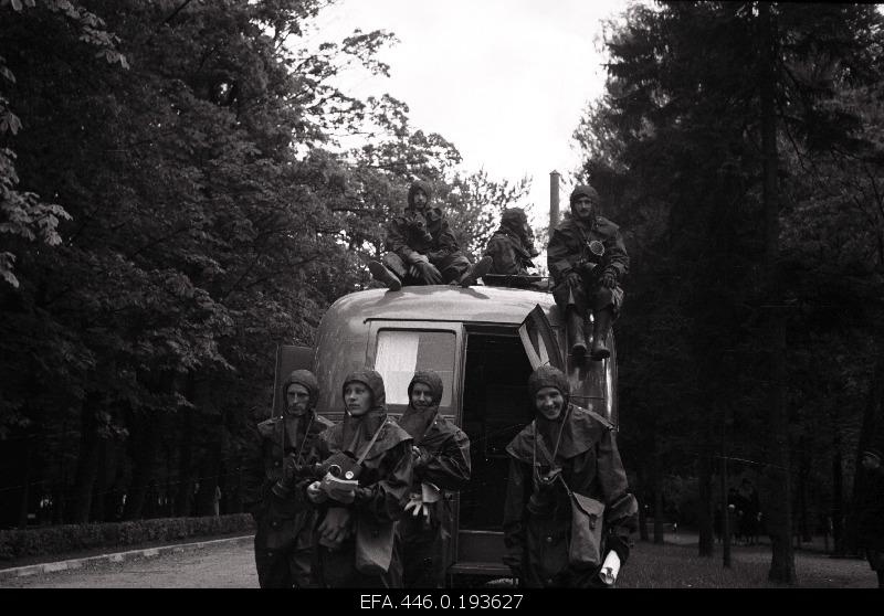 Urban Air Protection (all) Propaganda-Economic Week; gas team on exit.