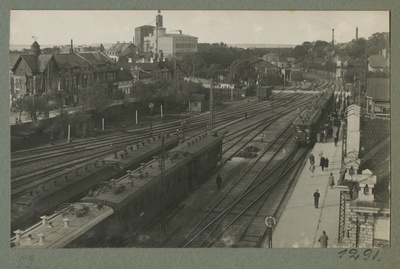Baltic Station - a view from the street of the Baltic Station building to the area of the Nõmme electric tram waiting platform (between Suurtüki Street). On the left Kpl Street.  duplicate photo